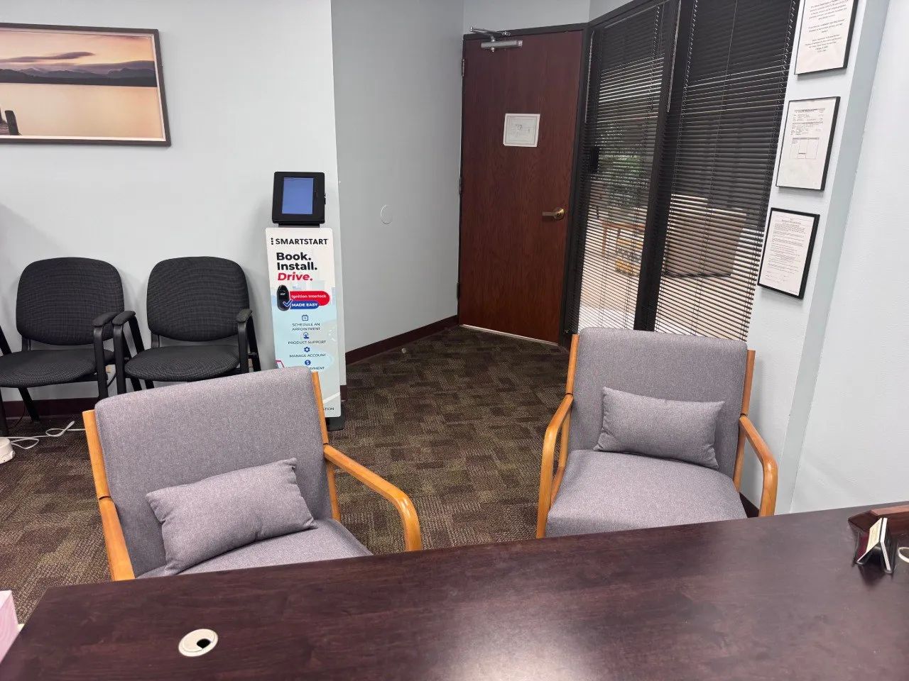 DUI Evaluation & Treatment Services private evaluation office at 1999 Wabash Ave Springfield IL — client seating, SmartStart kiosk, credentials on wall